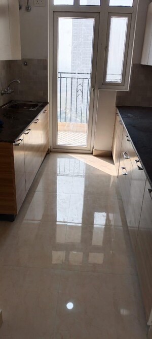 Kitchen in 2 BHK Apartment at Ace Starlit, Sector 152 – for Rent