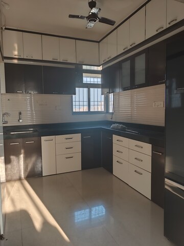 Kitchen in 3 BHK Apartment at Cosmos Jewels Solitaire, Ghodbunder Road – for Rent