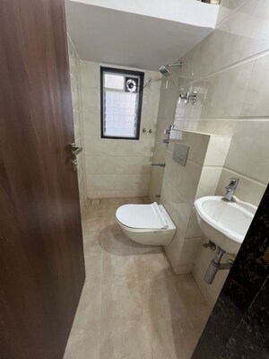 Bathroom in 2 BHK Apartment at Sai Nakhawa Enclave, Naupada – for Rent