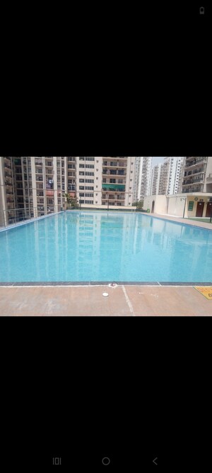 Swimming Pool in 2.5 BHK Apartment at Antriksh Golf View, Sector 78 – for Rent
