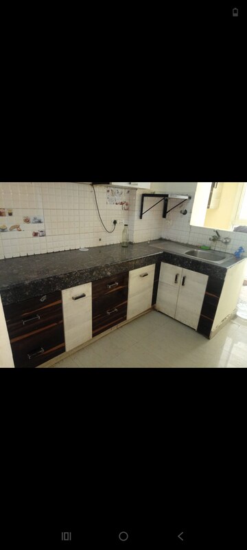 Kitchen in 2.5 BHK Apartment at Antriksh Golf View, Sector 78 – for Rent