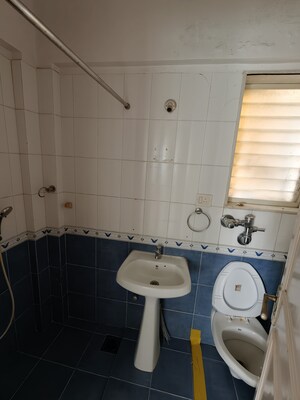 Bathroom in 2 BHK Apartment at Bredco Viceroy Court, Kandivali East – for Sale