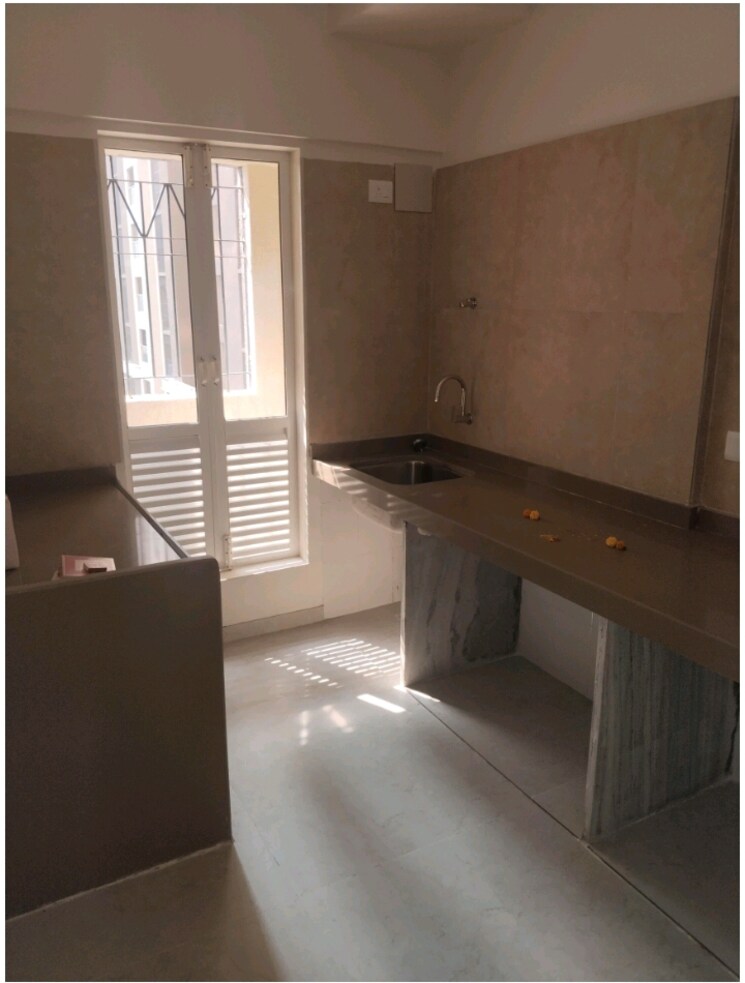 Kitchen, dosti-west-county-phase-4-dosti-pine 2 Bedroom 711 Sq.Ft. Apartment In Balkum Pada Thane 9579393