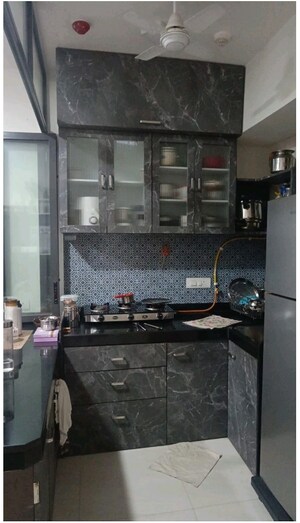 Kitchen in 1 BHK Apartment at Lodha Crown Quality Homes, Majiwada – for Sale