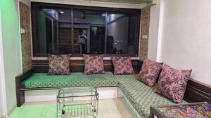Living Room in 1 BHK Apartment at Kopar Khairane – for Rent