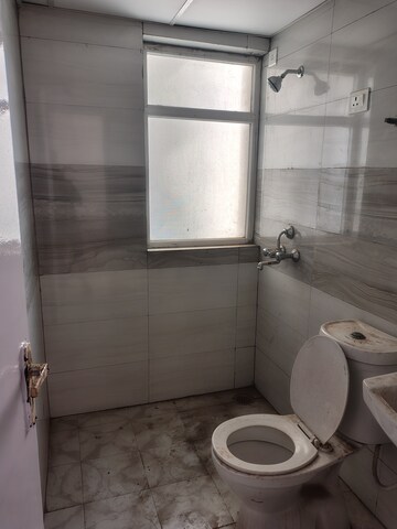 Bathroom in 3 BHK Apartment at Amrapali Leisure Park, Amrapali Leisure Valley – for Rent