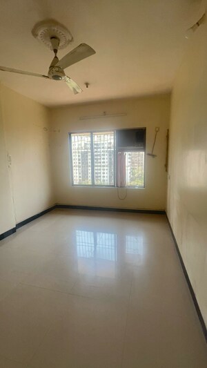 Room in 2 BHK Apartment at Riddhi Garden, Malad East – for Rent