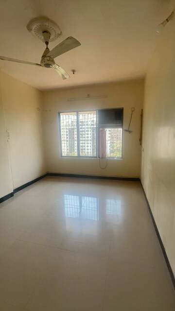 Room in 2 BHK Apartment at Riddhi Garden, Malad East – for Rent