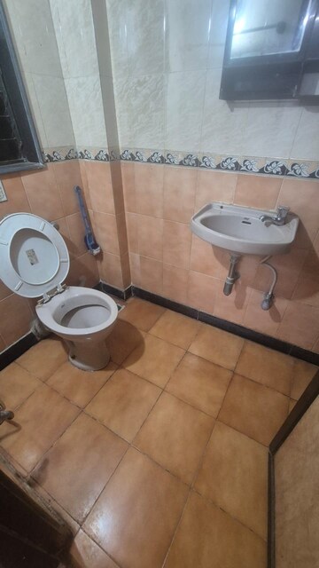 Bathroom in 2 BHK Apartment at Riddhi Garden, Malad East – for Rent