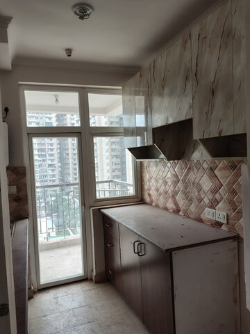 Kitchen in 2.5 BHK Apartment at Amrapali Leisure Park, Amrapali Leisure Valley – for Rent