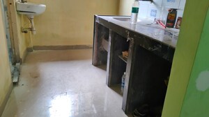 Kitchen in 1 RK Apartment at Swadeshi CHS, Chunabhatti – for Sale