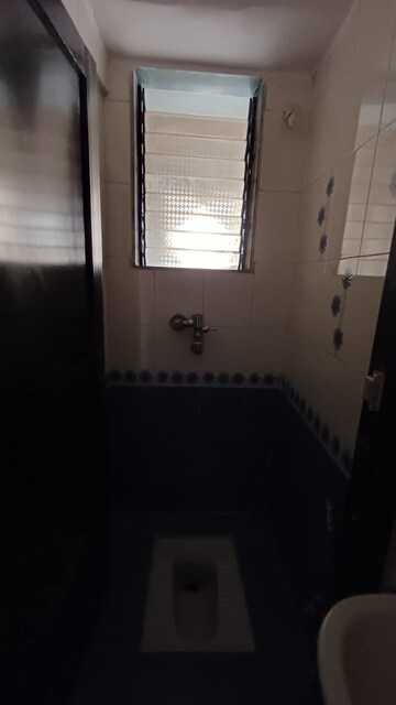 Bathroom in 2 BHK Apartment at Flower Valley Complex, Khopat – for Rent