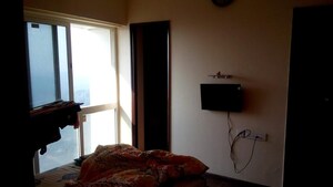 Bedroom in 2 BHK Apartment at Omkar Ananta, Goregaon East – for Rent
