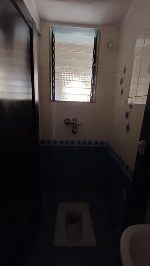 Bathroom in 2 BHK Apartment at Flower Valley Complex, Khopat – for Rent