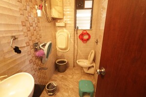Bathroom in 3 BHK Apartment at T Bhimjyani Neelkanth Woods, Manpada – for Rent