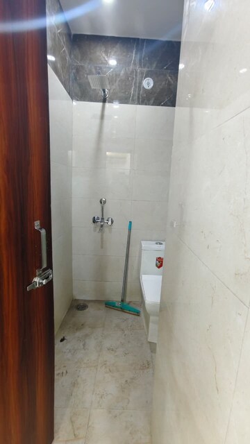 Bathroom in 1.5 BHK Builder Floor at Kalkaji – for Rent