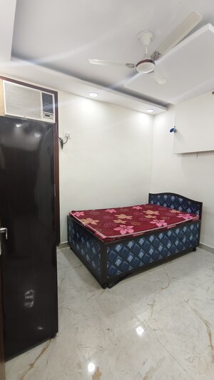 Bedroom in 1.5 BHK Builder Floor at Kalkaji – for Rent