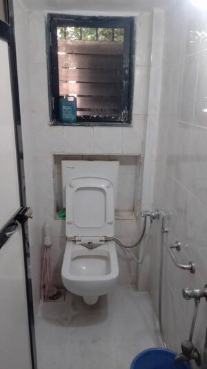 Bathroom in 2 BHK Apartment at Dhuri Complex, Vasai West – for Sale