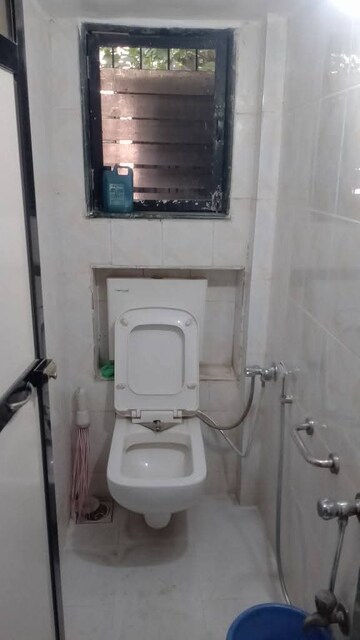 Bathroom in 2 BHK Apartment at Dhuri Complex, Vasai West – for Sale