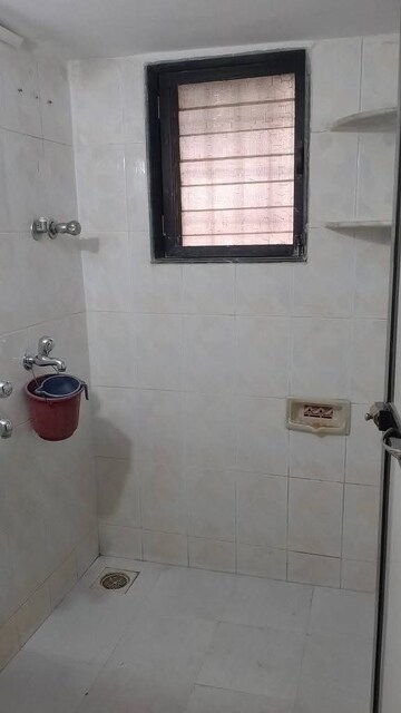 Bathroom in 2 BHK Apartment at Dhuri Complex, Vasai West – for Sale