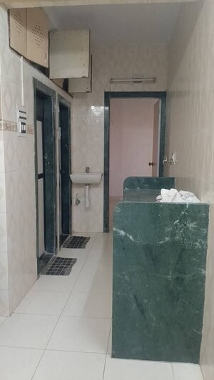 Kitchen in 2 BHK Apartment at Dhuri Complex, Vasai West – for Sale