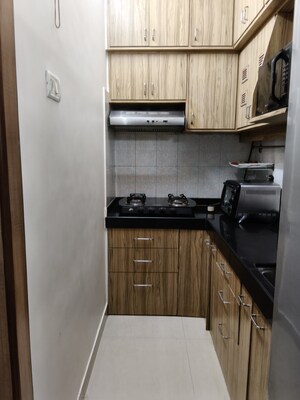 Kitchen in 1.5 BHK Apartment at Golden Orchid, Santacruz East – for Rent