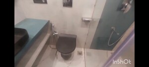 Bathroom in 4 BHK Apartment at Woodstock Apartments, Versova – for Rent