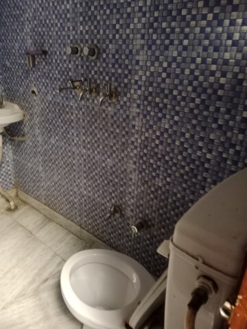 Bathroom in 1.5 BHK Builder Floor at Huda – for Rent