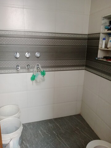 Bathroom in 1.5 BHK Builder Floor at Huda – for Rent