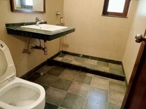 Bathroom in 3 BHK Builder Floor at Chirag Enclave – for Rent