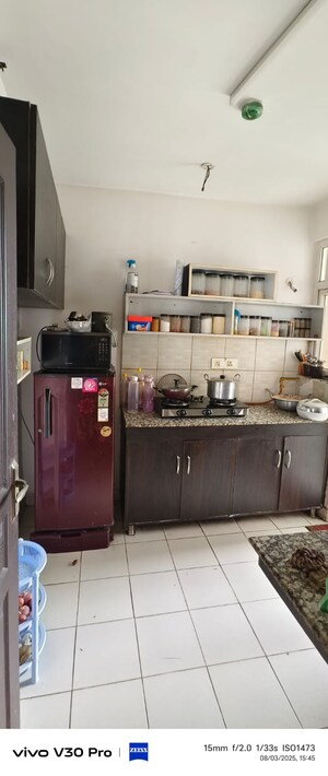 Kitchen in 2 BHK Apartment at Sikka Karnam Greens, Sector 143b – for Rent