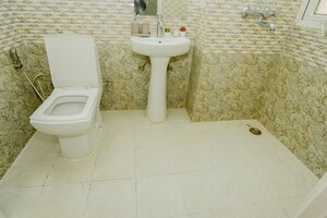 Bathroom in 2.5 BHK Apartment at VVIP Homes, Gaur City 2 – for Rent