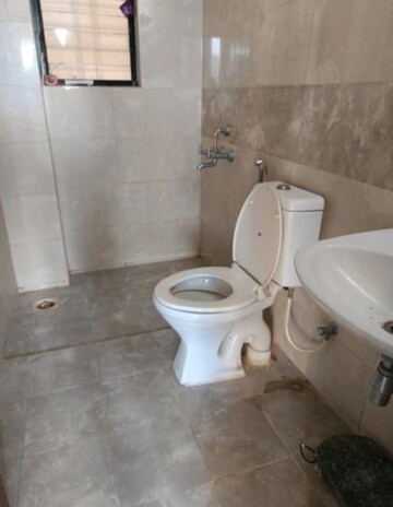Bathroom in 2 BHK Apartment at Kolte Patil Margosa Heights, Mohammadwadi – for Sale