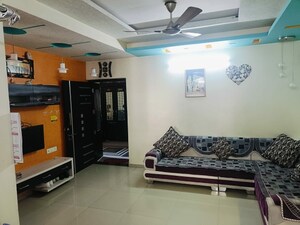 Living Room in 2 BHK Apartment at Ghatlodia – for Sale