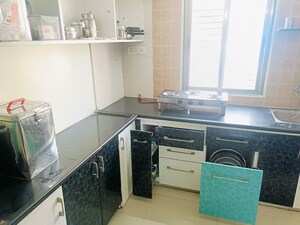 Kitchen in 2 BHK Apartment at Ghatlodia – for Sale