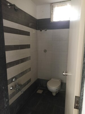 Bathroom in 2 BHK Apartment at Swastik Divine, Science City – for Rent