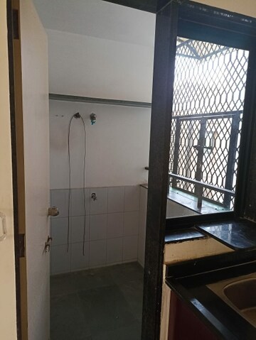 Bathroom in 2 BHK Apartment at Swastik Divine, Science City – for Rent