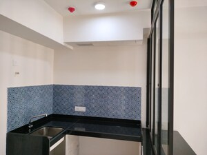 Kitchen in 1 BHK Apartment at Lodha Crown Quality Homes, Majiwada – for Rent