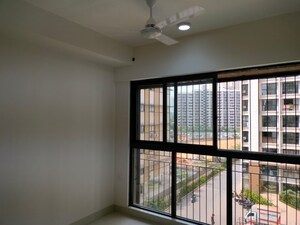 Living Room in 1 BHK Apartment at Lodha Crown Quality Homes, Majiwada – for Rent