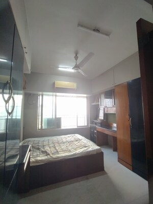Bedroom in 2 BHK Apartment at Bruck Hill Tower, Andheri West – for Rent
