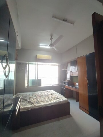 Bedroom in 2 BHK Apartment at Bruck Hill Tower, Andheri West – for Rent