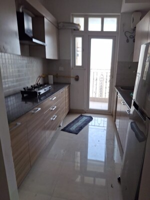 Kitchen in 2 BHK Apartment at Ajnara Homes, Sector 16b Greater Noida – for Rent