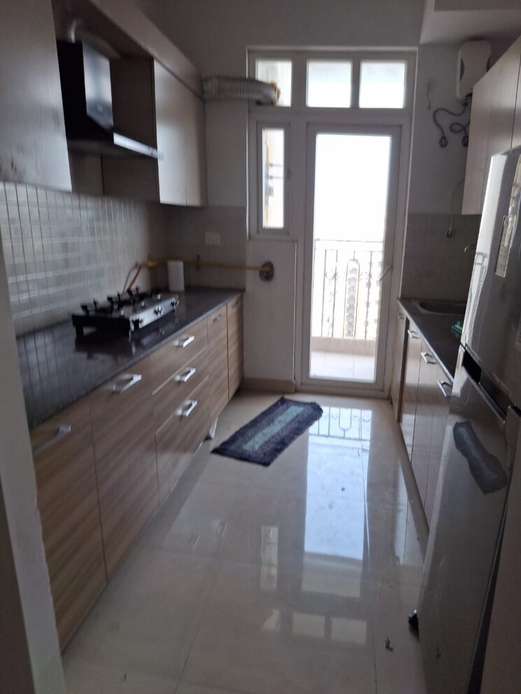Kitchen, ajnara-homes 2 Bedroom 880 Sq.Ft. Apartment In Sector 16b Greater Noida Greater Noida 9580580