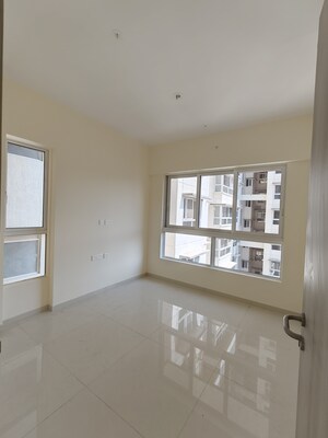 Room in 2.5 BHK Apartment at Wadhwa TW Gardens, Kandivali East – for Sale