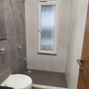 Bathroom in 3 BHK Apartment at Omkar Alta Monte, Laxman Nagar – for Rent