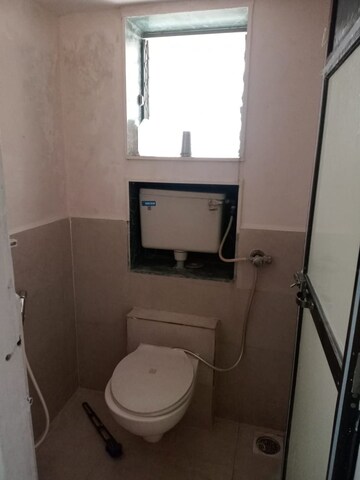 Bathroom in 2 BHK Apartment at Rukmini Niwas CHS, Dahisar West – for Rent