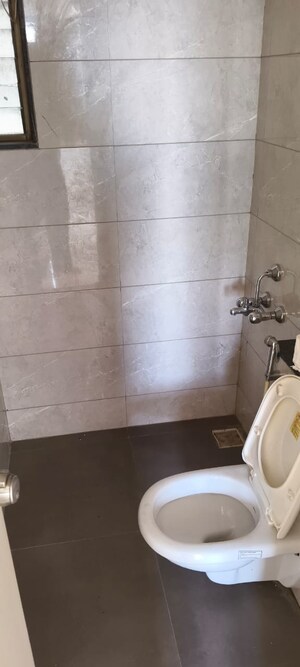 Bathroom in 2 BHK Apartment at Saanvi Nirman Celesta, Ghuma – for Rent