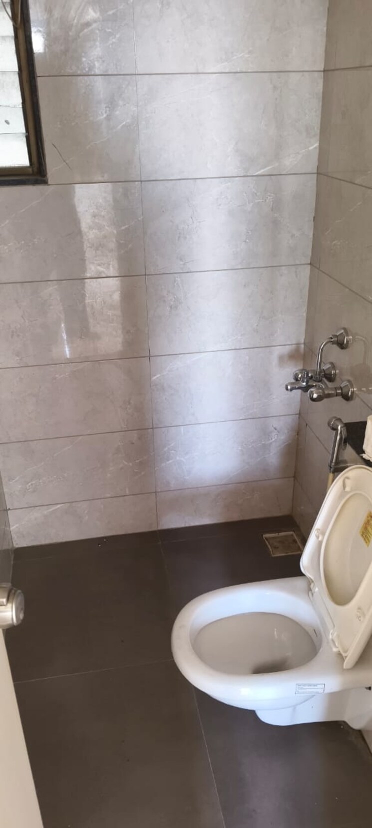 Bathroom, saanvi-nirman-celesta 2 Bedroom 1050 Sq.Ft. Apartment In Ghuma Ahmedabad 9580825