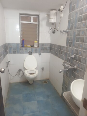 Bathroom in 1 BHK Apartment at Dimple Pinnacolo, Mira Road – for Rent