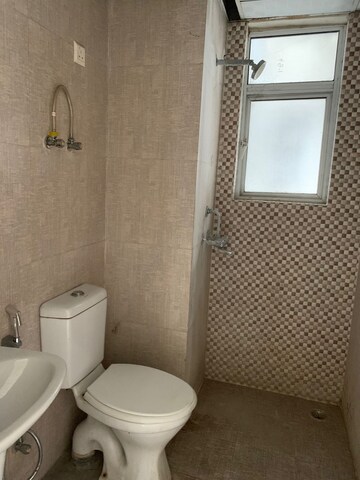 Bathroom in 2 BHK Apartment at Aditya Urban Homes, Shahpur Bamheta – for Rent